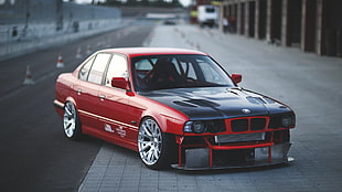 red and black BMW sedan