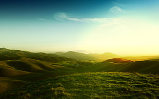 landscape photography of green grass hills
