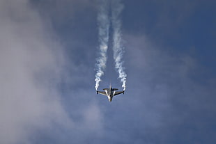 silver jet flying in the sky leaving jet stream HD wallpaper