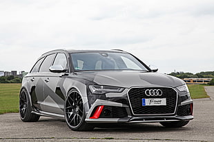 gray and black Audi 5-door hatchback on gray concrete surface HD wallpaper