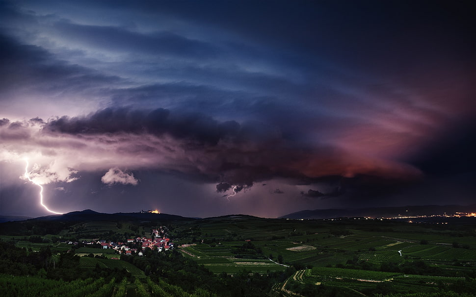 cloudy above green mountain HD wallpaper