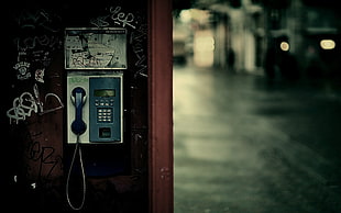gray and brown telephone, city