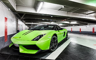 green Lamborghini Gallardo parked near wall HD wallpaper