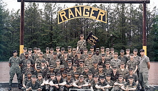 group of Ranger soldiers near on forest during daytime