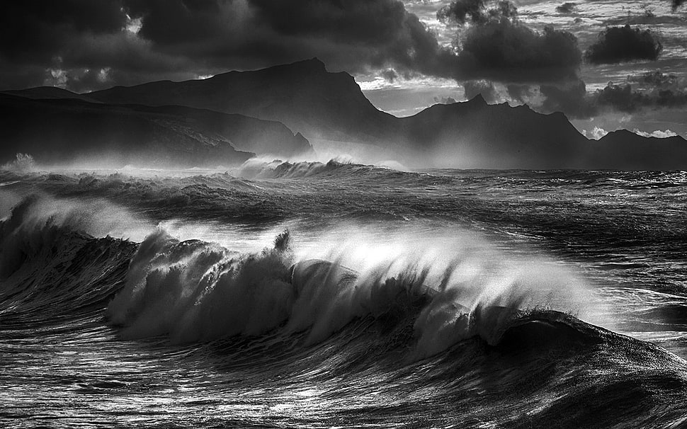 grayscale landscape photography of sea waves near mountains HD wallpaper