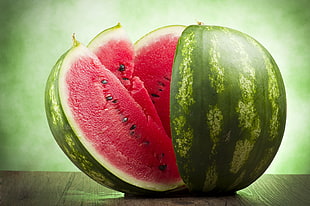 sliced water melon on top of brown table HD wallpaper