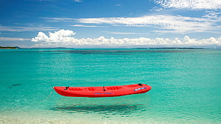 red kayak, boat, sea