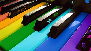 closeup photo of multicolored piano keys HD wallpaper