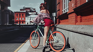 green bicycle, women, sandals, redhead, sunglasses