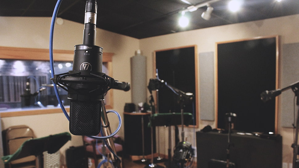 black condenser microphone selective-focus photography with studio on background HD wallpaper