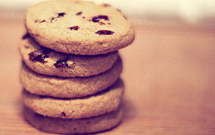 five cookies on wooden surface HD wallpaper