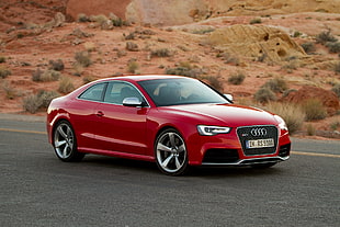 red Audi coupe  on road HD wallpaper