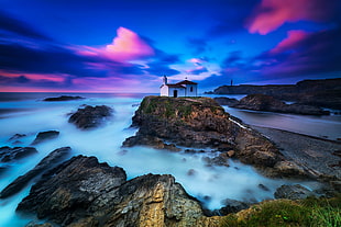 time lapse photography of house on top of rock formation, porto