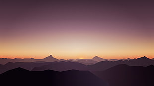 aerial photography of mountains during sunset