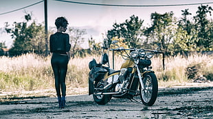 black and grey cruiser motorcycle, women with bikes