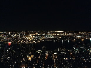 lighted city buildings, New York City, night, cityscape