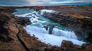 waterfalls between rock formation, iceland HD wallpaper