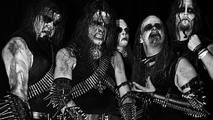 five men wearing costumes grayscale photo