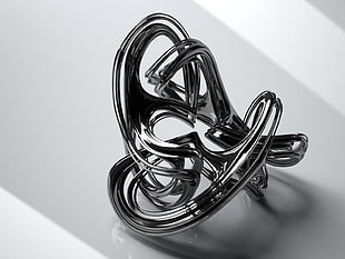 grayscale photography of silver ornament