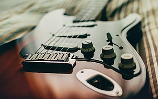 selective focus photography of a brown and black electric guitar HD wallpaper