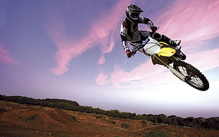 yellow, white, and black motocross dirt bike, Suzuki, jumping, motorsports, motocross