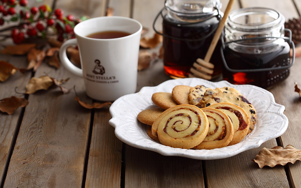 cookies in plate beside honeys and a coffee HD wallpaper