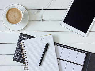 black pen, white notebook and a cup of latte HD wallpaper