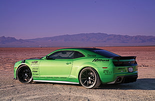 photography of green sports car