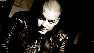 grayscale photo of man wearing jacket