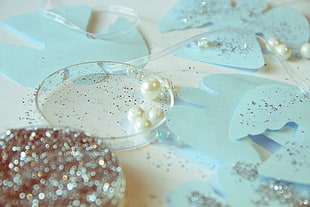 close up photo of white beads
