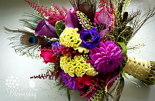 assorted color flower bouquet on white surface