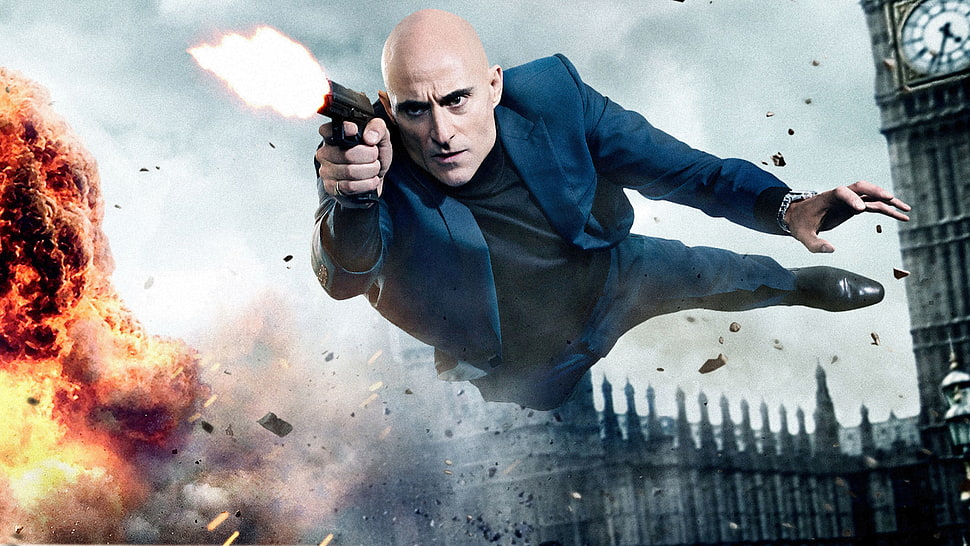 man wearing blue blazer leaped from explosion with pistol on his hands HD wallpaper