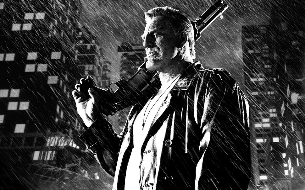 grayscale photo of man holding shotgun during rain HD wallpaper
