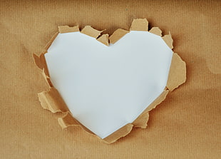 white and brown heart origami