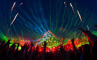 fireworks display, music festival, crowds, hands