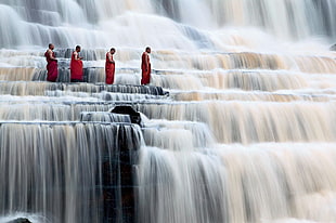 four person walking across waterfalls, nature, landscape, waterfall, people