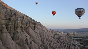 several assorted-color hot air balloons, hot air balloons