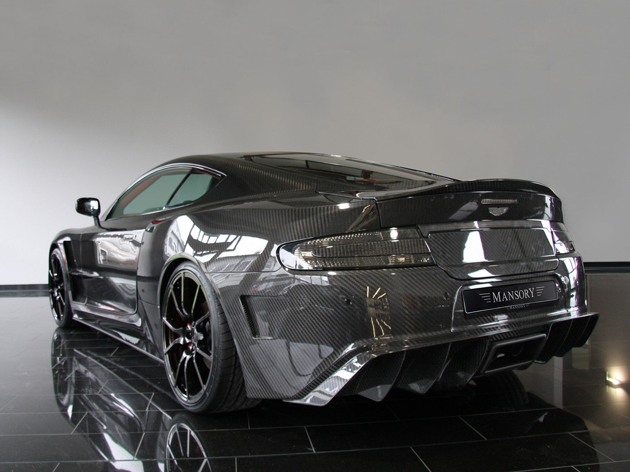 gray carbon fiber Aston Martin DB-series