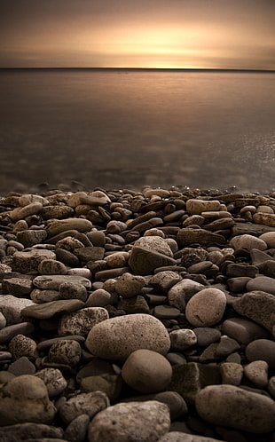 assorted stones on body of water, lake ontario HD wallpaper