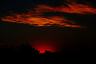 black and red dawn scene
