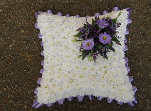 white-and-purple throw pillow