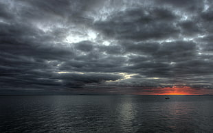 black and gray wooden table, sky, sunlight, clouds, sea