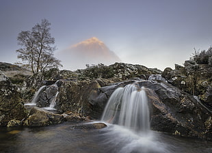 timelapse photography of waterfall at daytime HD wallpaper