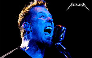 Metallica man shouting in front of microphone