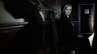gray scale photo of woman wearing black jacket leaning onw all HD wallpaper