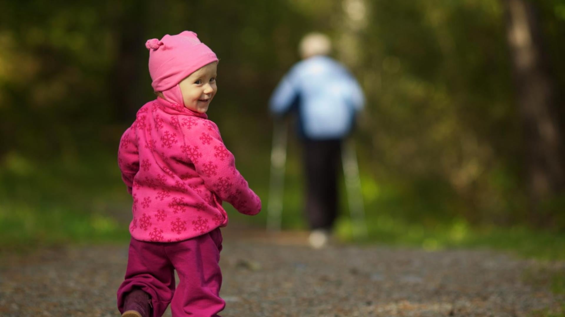 focus photography of boy walking