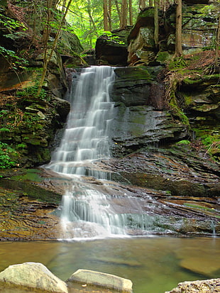 water falls flowing on rock formation, east branch