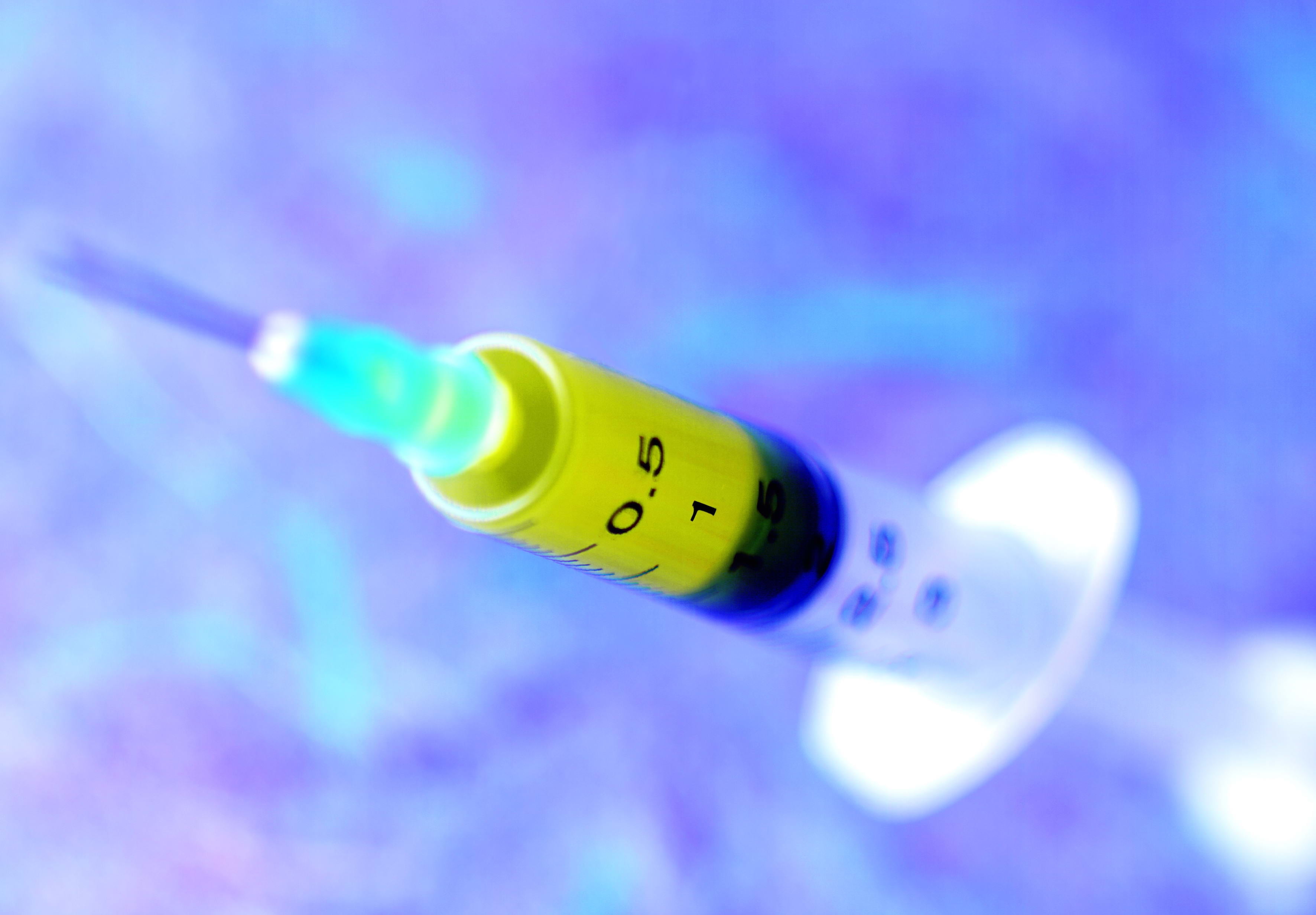 close-up photography of syringe