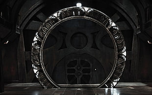 round gray wooden frames, Stargate, SG-U