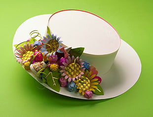 assorted colors flowers on white ceramic plate